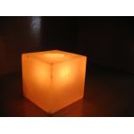 Square geometric Himalayan salt candle holder glowing